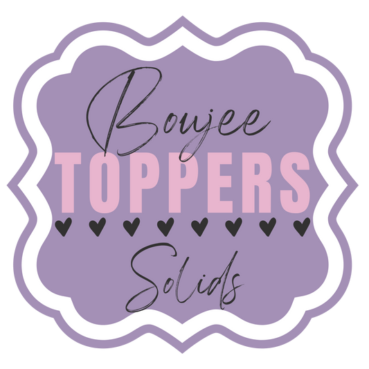 Lavender logo for Boujee Toppers Solids brand, featuring a scalloped frame and hearts. 
